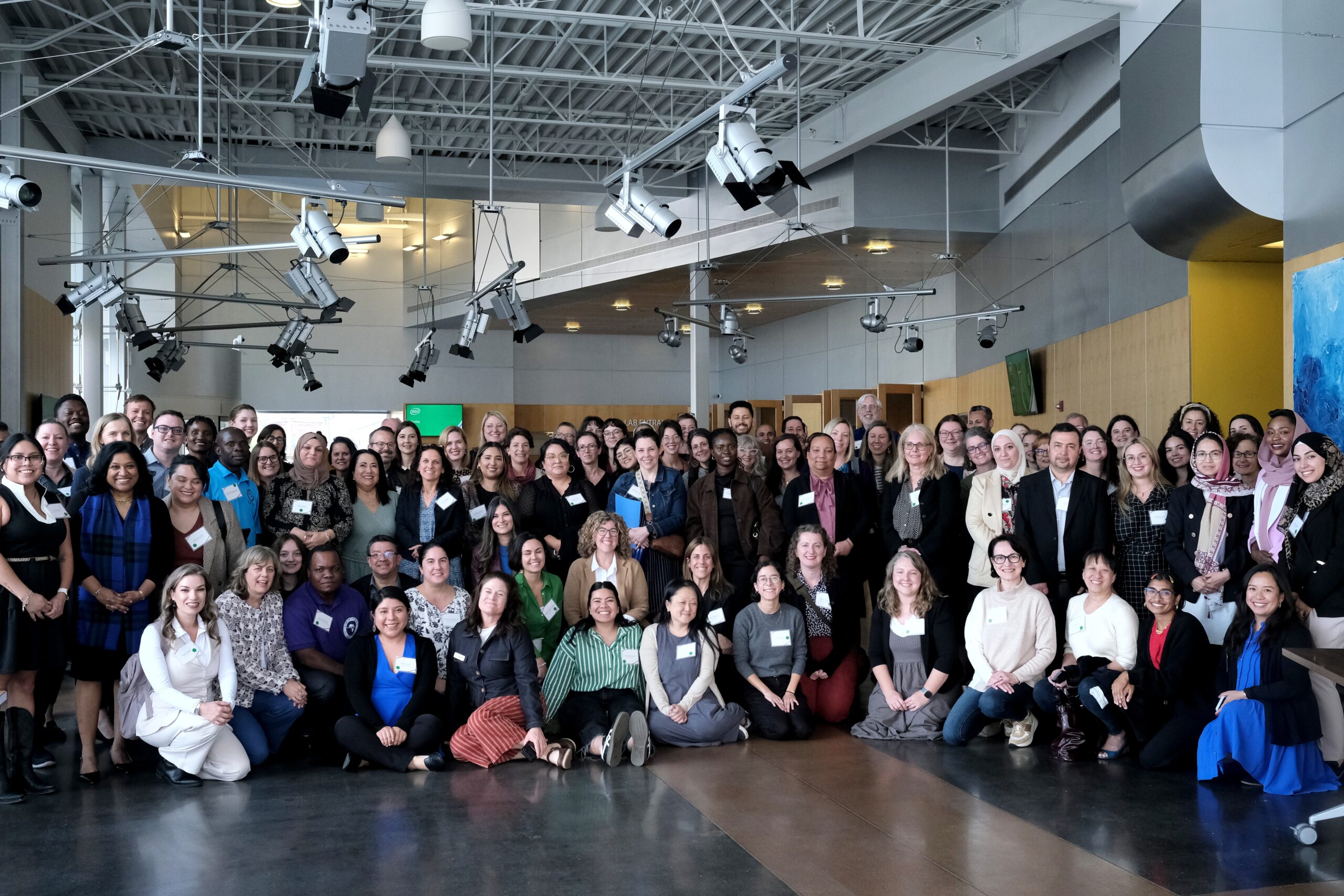 Strengthening Immigrant Inclusion Program team in a large group.