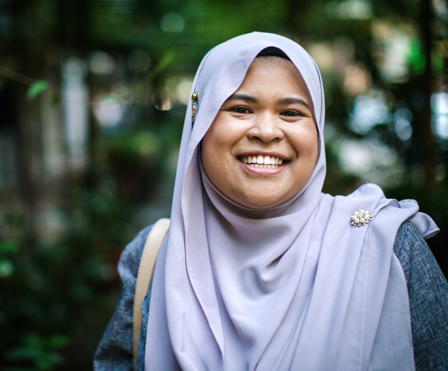 Portrait Of Smiling Woman In Hijab