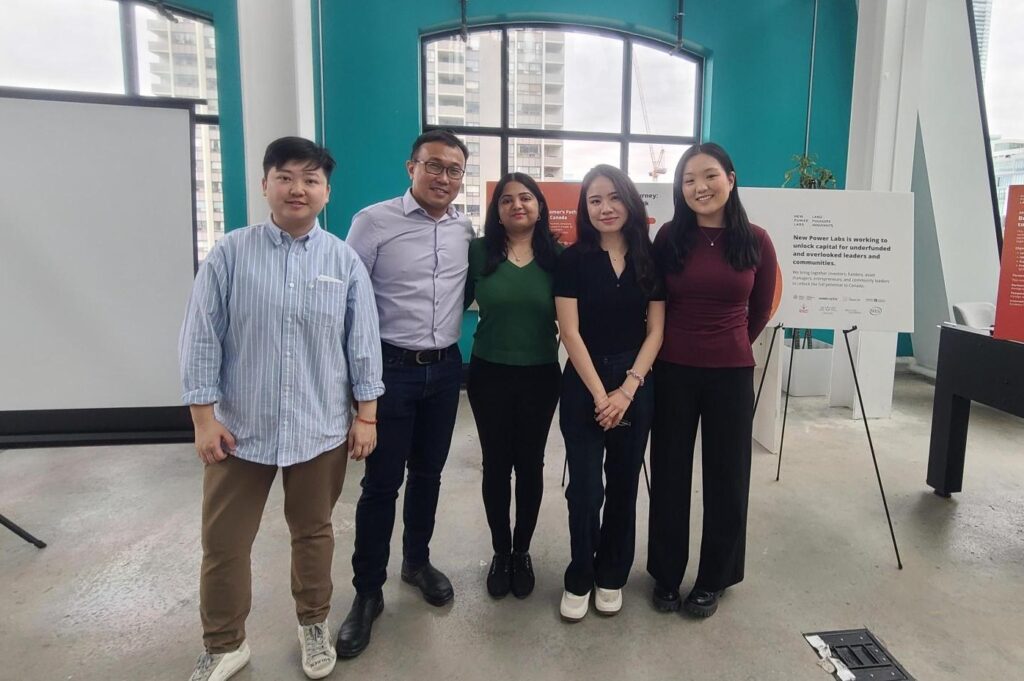 New Power Labs team pictured with Sifat Yusuf during their research presentation for "From Barriers To Breakthroughs"