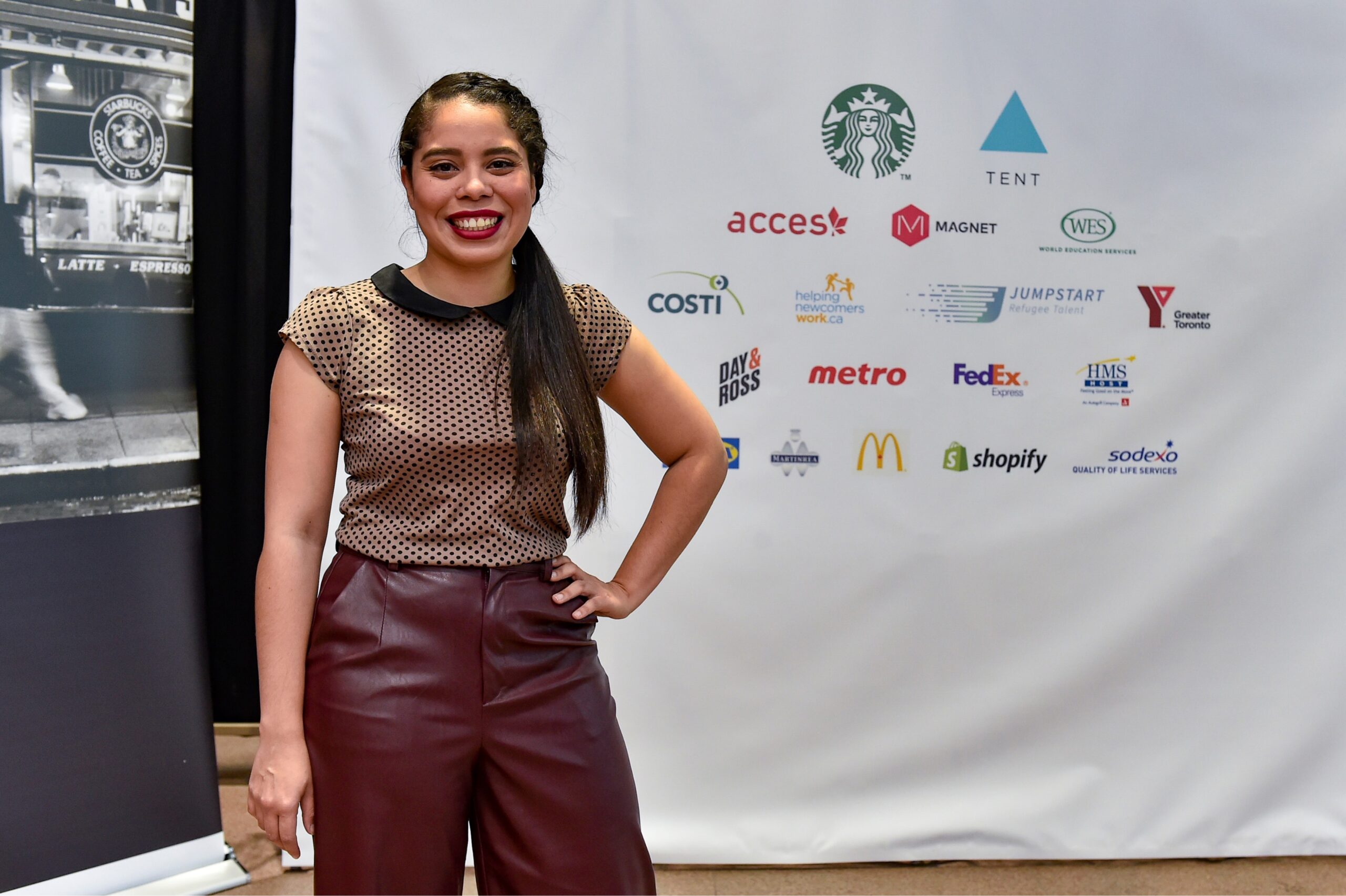 A woman at a refugee hiring event smiling © David Trozzo, All Rights Reserved.