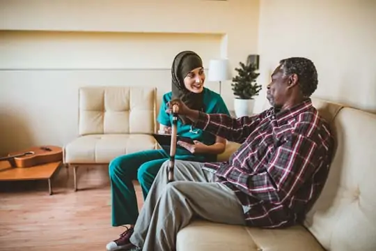 Nurse professional helping patient