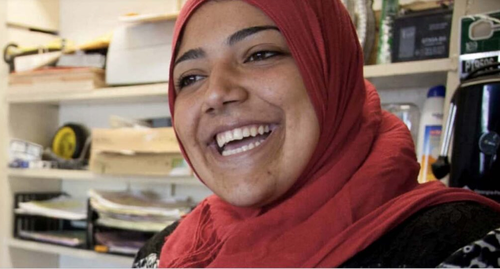 Young woman with a hijab smiling